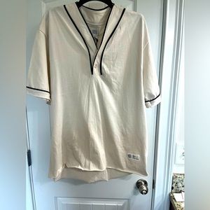 NWT Urban Outfitters Baseball style shirt. Creamy off white with dark green trim